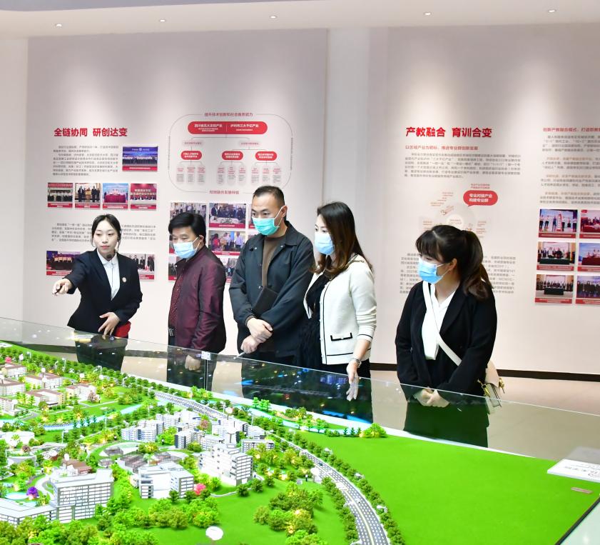 江阳城建职业学院涂秋生副校长一行到我校考察交流